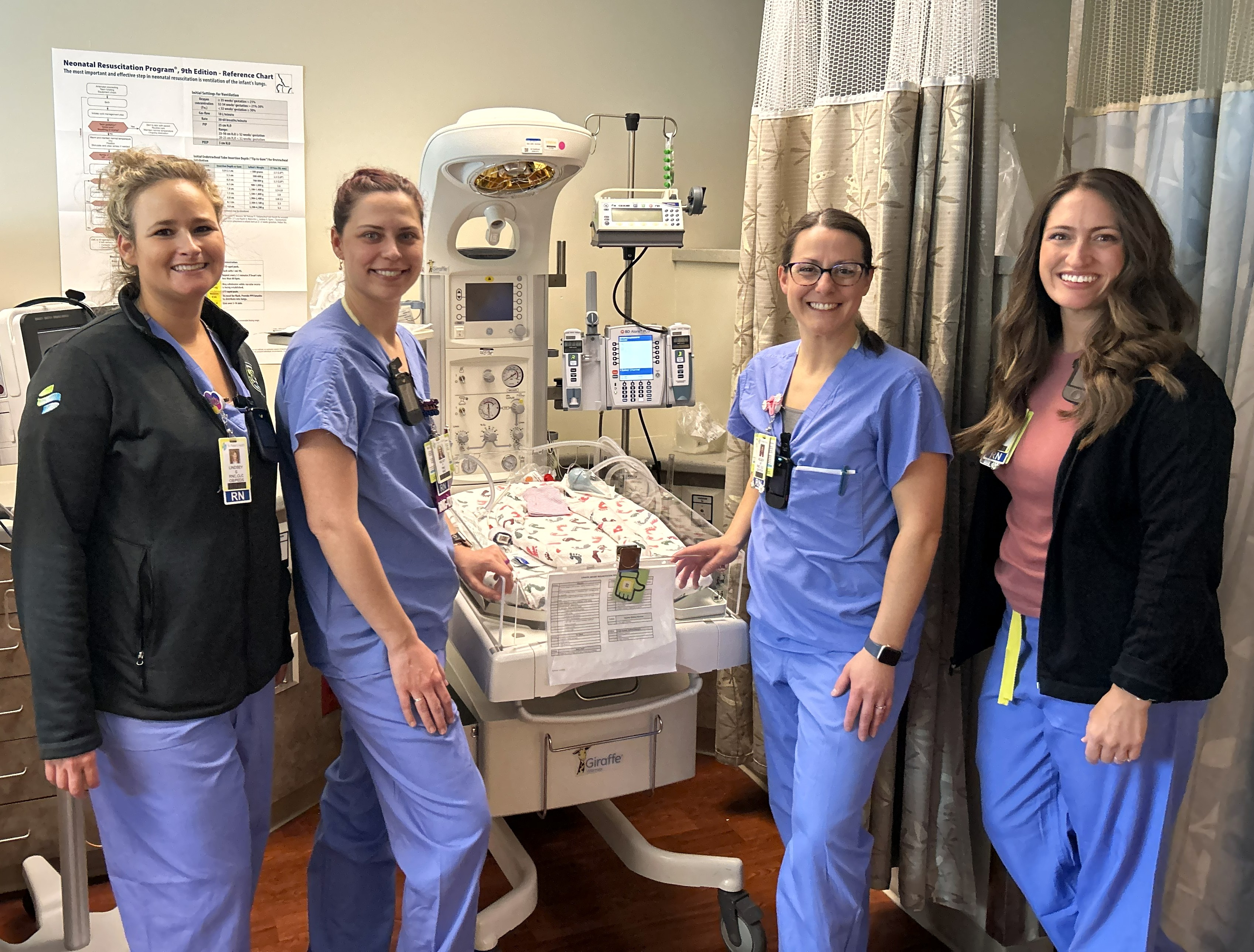 Neonatal nurses showcase the new pump in use at an infant bedside in the St. Peter's Health NICU